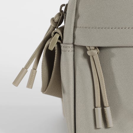 Lacoste - Bolsa vertical para cámara Beige