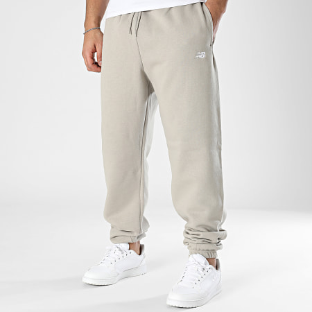 New Balance - Pantalones de chándal de forro polar MP41503 Taupe