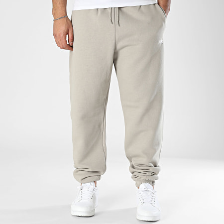 New Balance - Pantalones de chándal de forro polar MP41503 Taupe