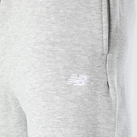 New Balance - Pantalones de chándal de forro polar MP41503 Gris jaspeado