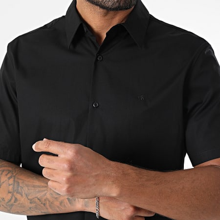 Calvin Klein - Chemise Manches Courtes Slim Solid Stretch LV04LB147G Noir