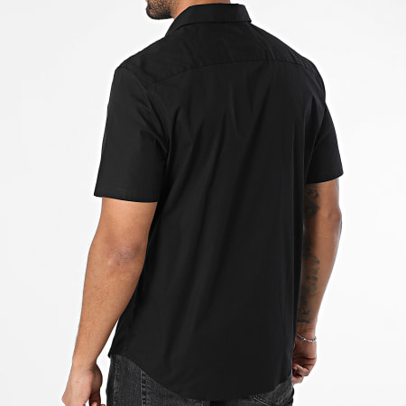 Calvin Klein - Chemise Manches Courtes Slim Solid Stretch LV04LB147G Noir