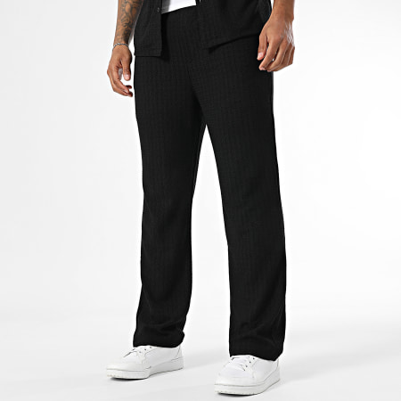 Uniplay - 160 Conjunto negro de camisa de manga corta y pantalón calado