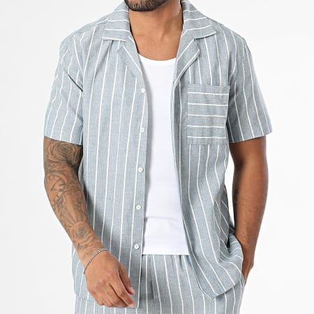 conjunto de camisa a rayas azul marino y blanco