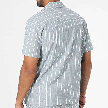 conjunto de camisa a rayas azul marino y blanco