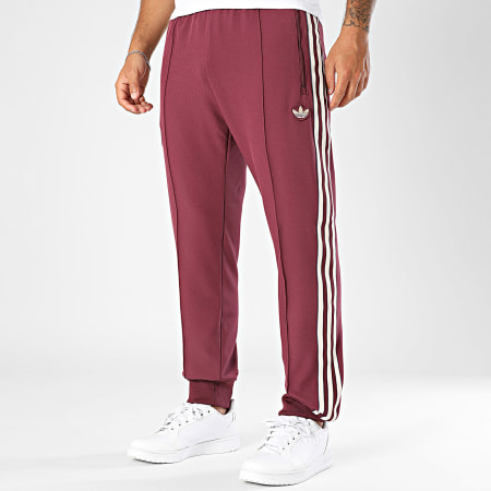 Adidas Sportswear - Pantaloni da jogging a banda bordeaux