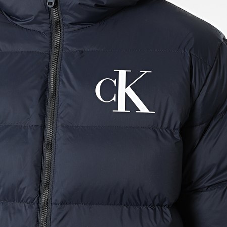 Calvin Klein - Doudoune Capuche Zippée RD528G Bleu Marine