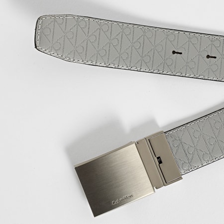 Calvin Klein - Cinturón reversible Titlecase Hebilla de placa 032G Negro Gris claro