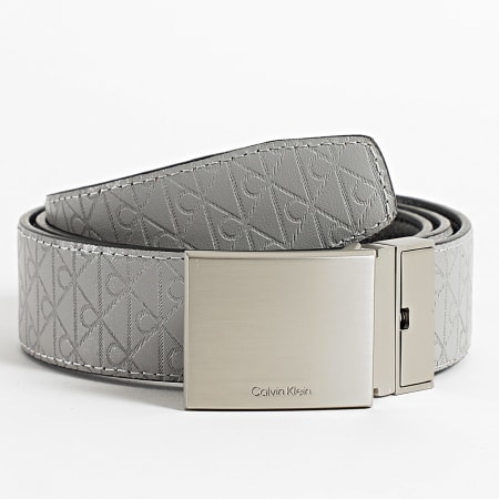 Calvin Klein - Cinturón reversible Titlecase Hebilla de placa 032G Negro Gris claro