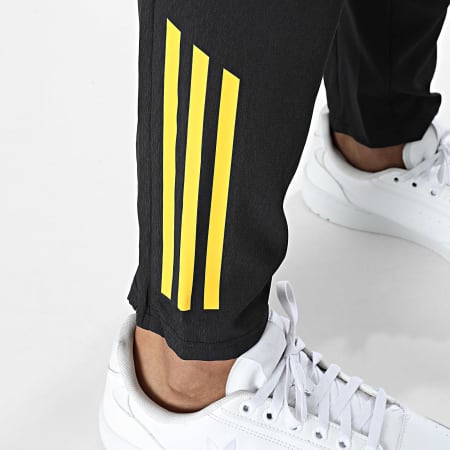 Adidas Sportswear - Pantalon Jogging Manchester United FC JP3135 Noir Jaune