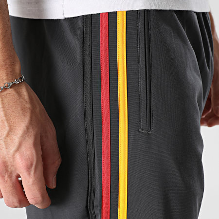 Adidas Originals - Pantalon Jogging A Bandes Firebird TP KD3831 Gris Anthracite Bordeaux Jaune