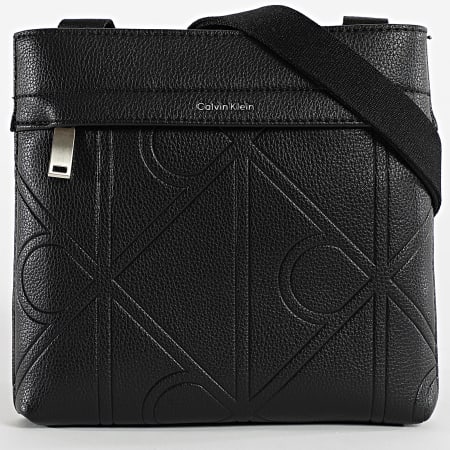 Calvin Klein - Sacoche Emblem Emboss Slim Flatpack D3370G Noir