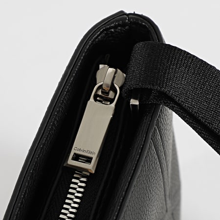 Calvin Klein - Sacoche Emblem Emboss Slim Flatpack D3370G Noir