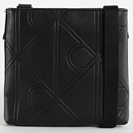 Calvin Klein - Sacoche Emblem Emboss Slim Flatpack D3370G Noir