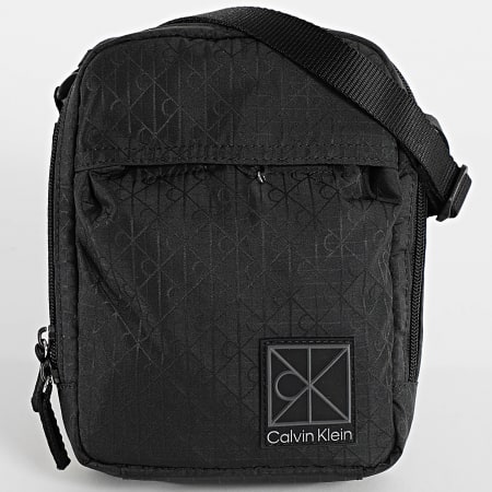 Calvin Klein - Sacoche Utility Emblem Reporter D3303G Noir