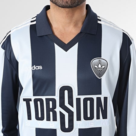 Adidas Originals - Tee Shirt Manches Longues Col V A Rayures Britcore Jersey HZ3787 Bleu Clair Bleu Marine