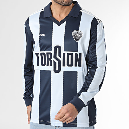 Adidas Originals - Tee Shirt Manches Longues Col V A Rayures Britcore Jersey HZ3787 Bleu Clair Bleu Marine
