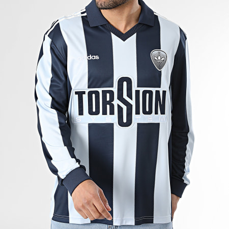 Adidas Originals - Tee Shirt Manches Longues Col V A Rayures Britcore Jersey HZ3787 Bleu Clair Bleu Marine