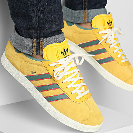 Adidas Originals - Baskets Gazelle KJ3532 Bold Gold None Pure Ruby x Bob Marley