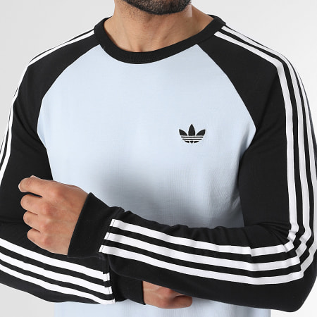 Adidas Originals - Tee Shirt Manches Longues A Bandes 3 Stripes KE2424 Bleu Clair Noir