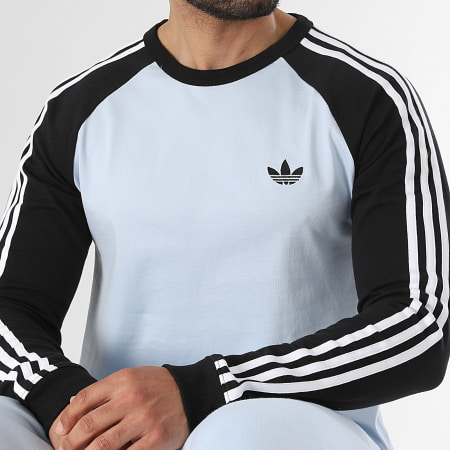 Adidas Originals - Tee Shirt Manches Longues A Bandes 3 Stripes KE2424 Bleu Clair Noir