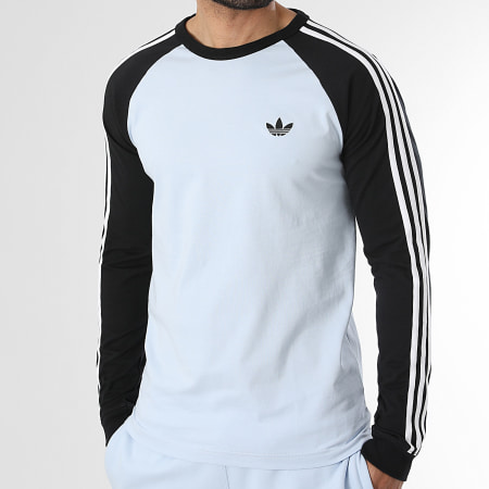 Adidas Originals - Tee Shirt Manches Longues A Bandes 3 Stripes KE2424 Bleu Clair Noir