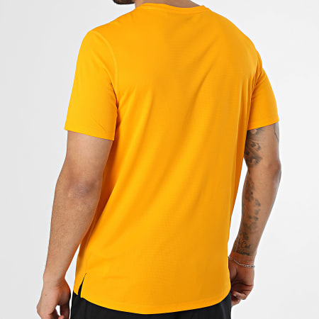 Asics - Conjunto Camiseta Y Pantalón Corto de chándal Asics Core 7In 2011D221 2011D213 Naranja Negro