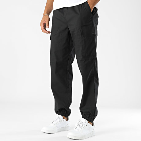 New Balance - Pantalones cargo de sarga MP41579 Negro