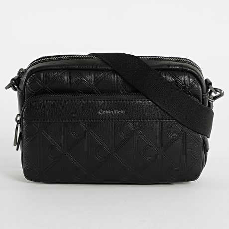 Calvin Klein - Bolsa Emblem AOP Deboss Camera Bag D3563 Negro