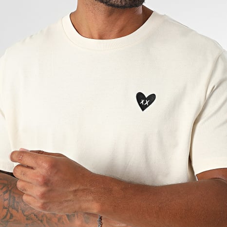 Luxury Lovers - T-shirt oversized groot zwart hart borduursel beige