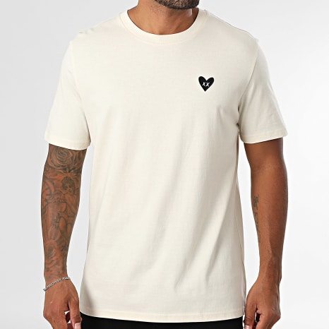 Luxury Lovers - T-shirt oversized groot zwart hart borduursel beige