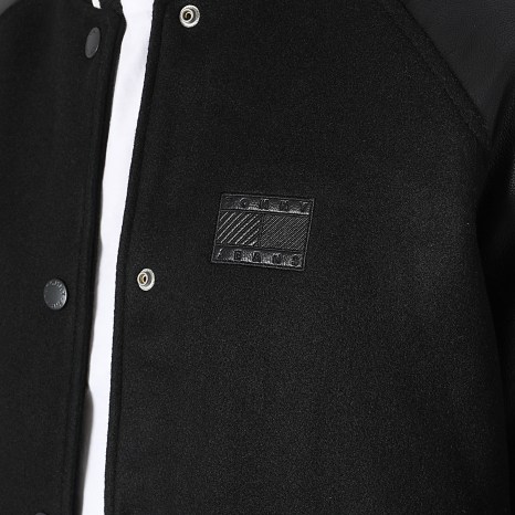 Tommy Jeans - Chaqueta Teddy de Piel Sintética TJM Flag Varsity 2557 Negra