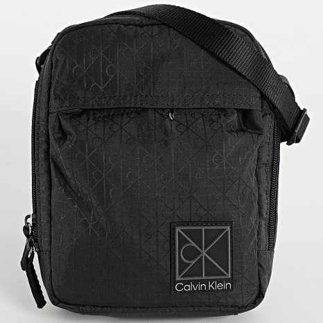 Calvin Klein - Bolso Utility Emblem Reporter D3303G Negro